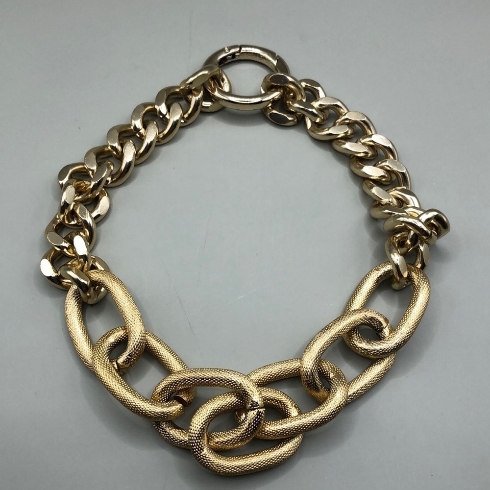 Gold tone chunky chain link utility runway style collar necklace statemenent.